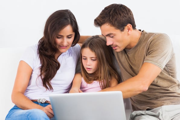 person entering billing info on a computer
