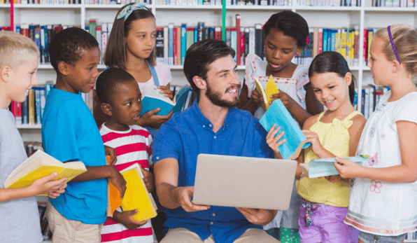 teacher with laptop: all-in-one platform for childcare