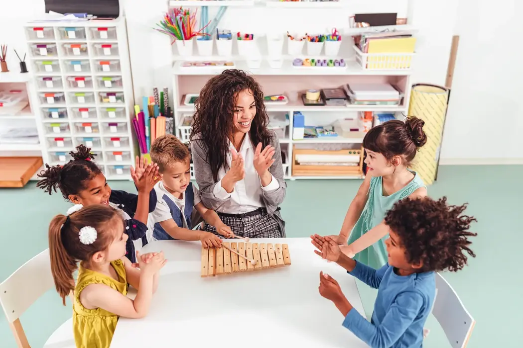 TeacherPlayingWithKids-1